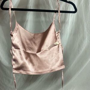dolls kill backless satin pink crop top